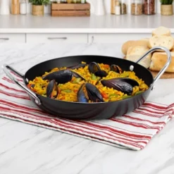 Oster® Oster Smithfire 11 Inch Nonstick Carbon Steel Paella Pan In Dark Gray -Cookware Store GUEST 7c75e43c 3fd7 4b66 8160 63acfe29f8f6